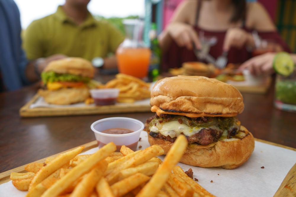 friends enjoying burgers in philadelphia