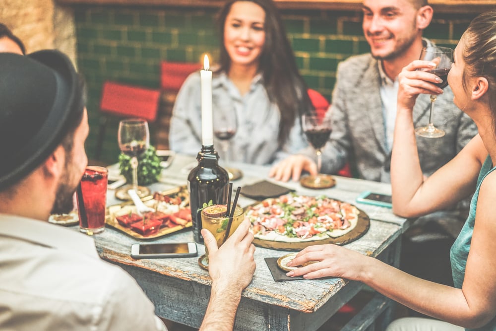 hipsters casually dining at a trendy restaurant