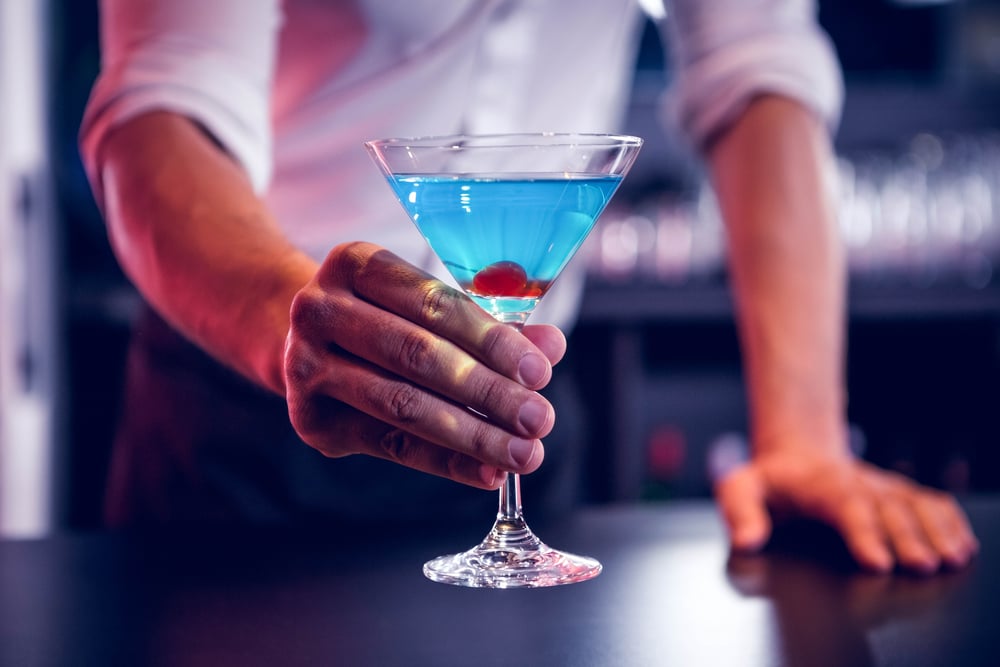 Blue Martini is made of Vodka, blue curacao, angostura bitters