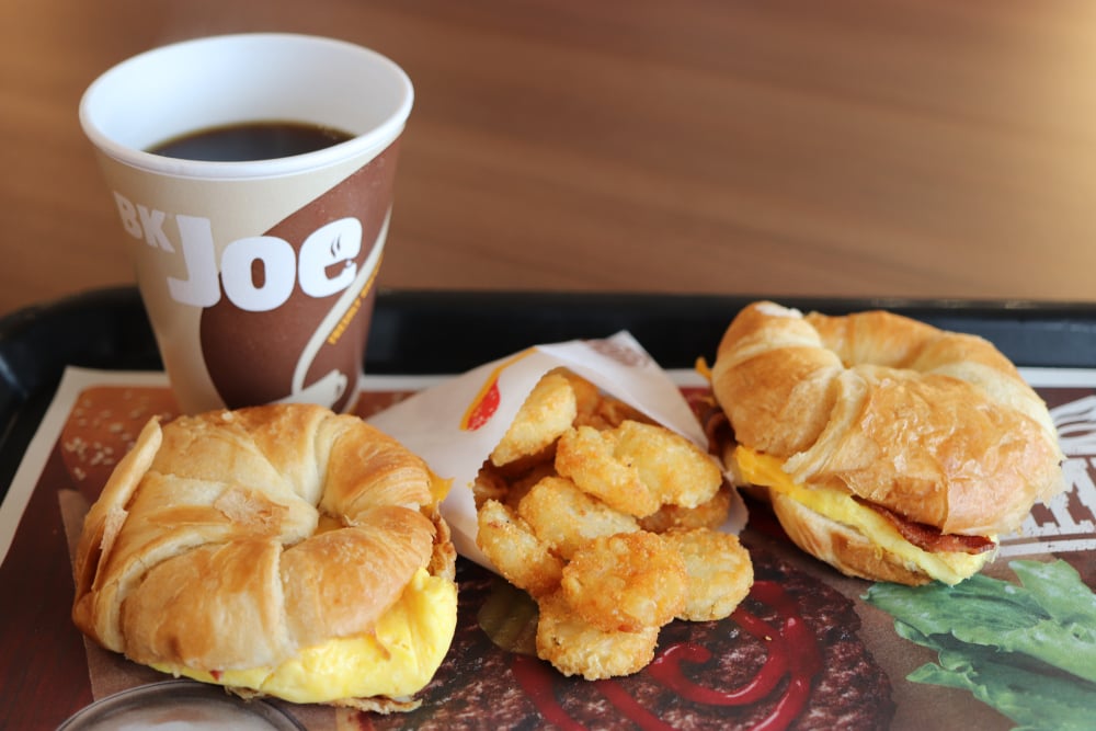 burger king croissant sandwiches, hash browns, and coffee