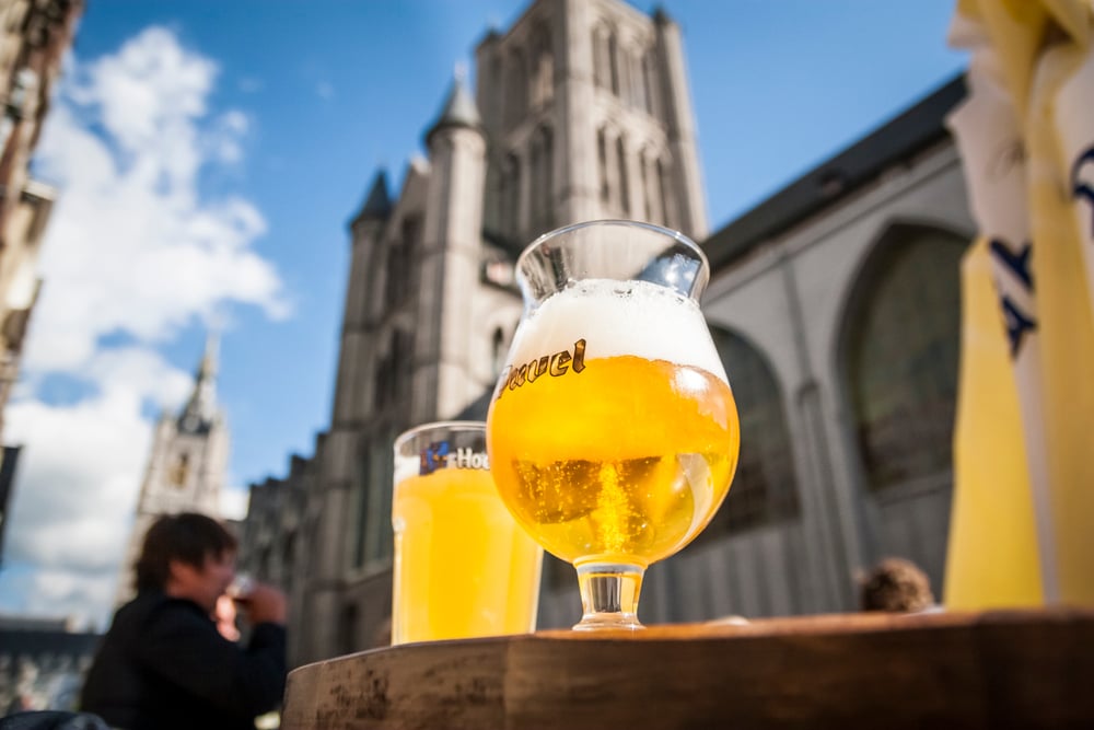 Two belgian beers on a terrace table