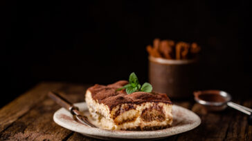 A piece of Italian tiramisu cake on a plate