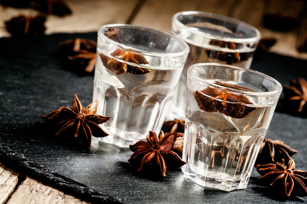 three glasses of pastis cocktails on a table