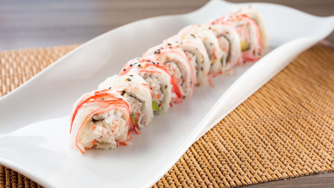 A view of an imitation crab roll sushi plate