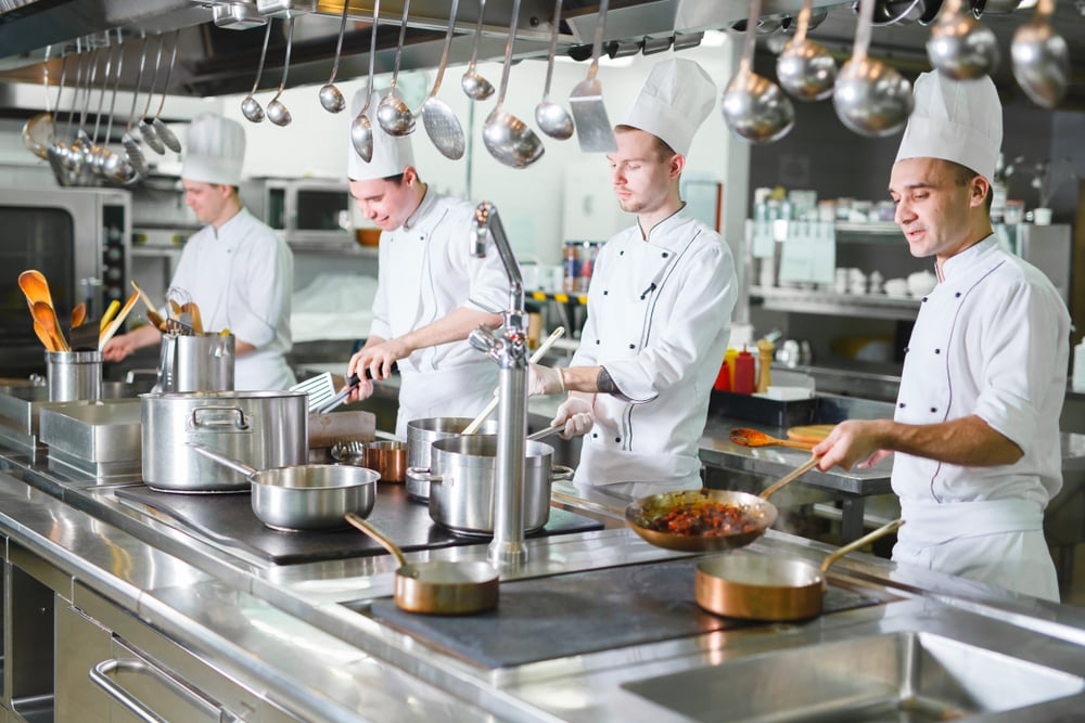 Chefs cooks in a restaurant