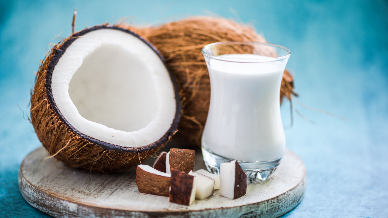 fresh and healthy coconut milk with whole nut and pieces
