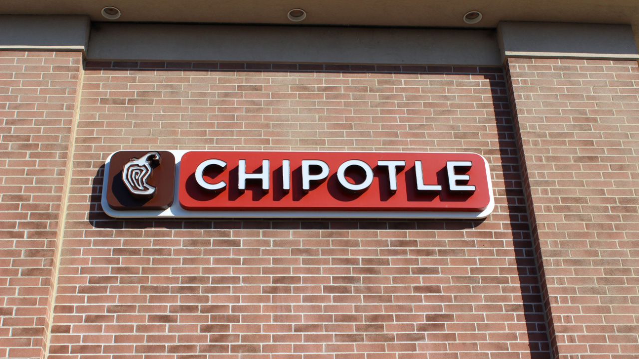 Sign for CHIPOTLE on Side of Restaurant Building